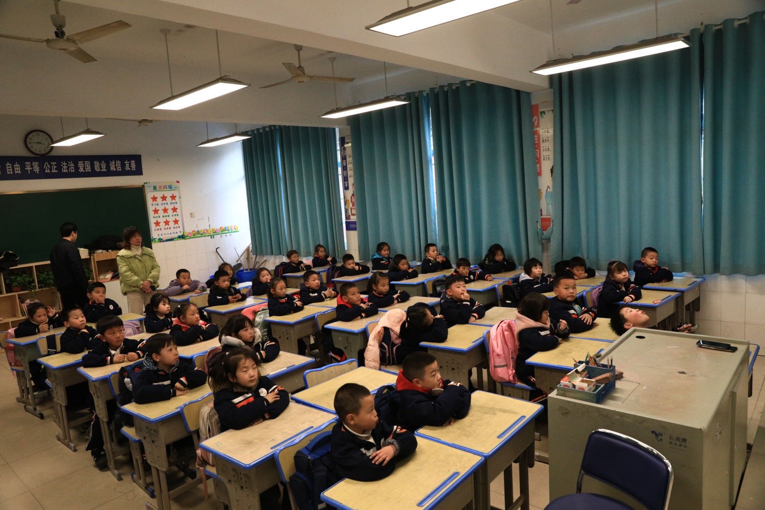 风车坪学校举行“品窑湾历史文化，学中国拓印艺术”活动
