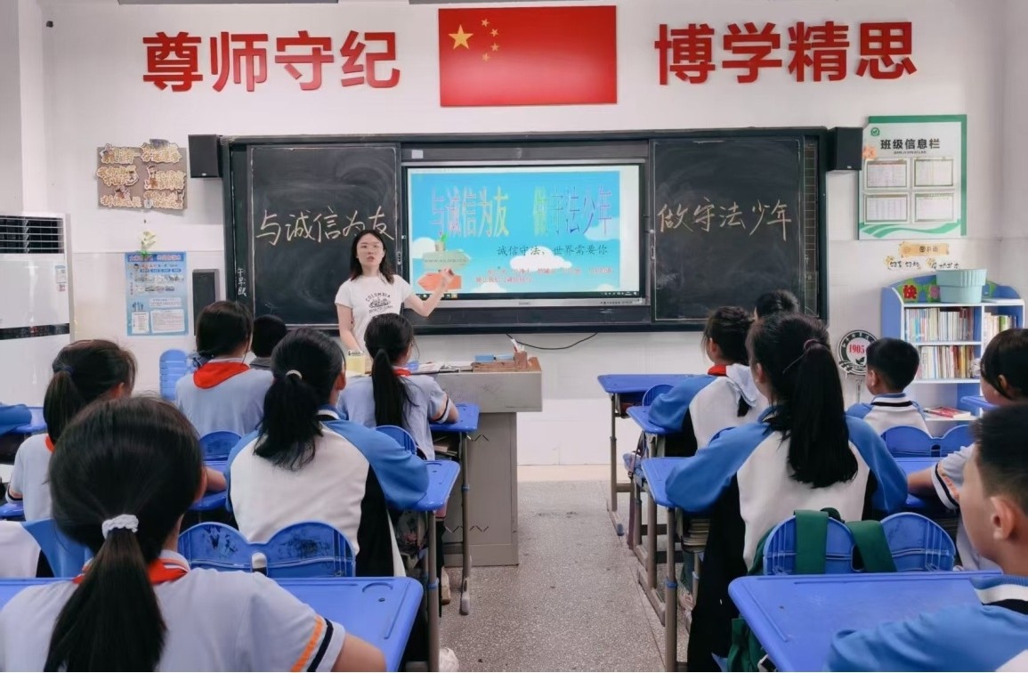 桃李社区开展“与诚信为友.做守法少年”主题活动