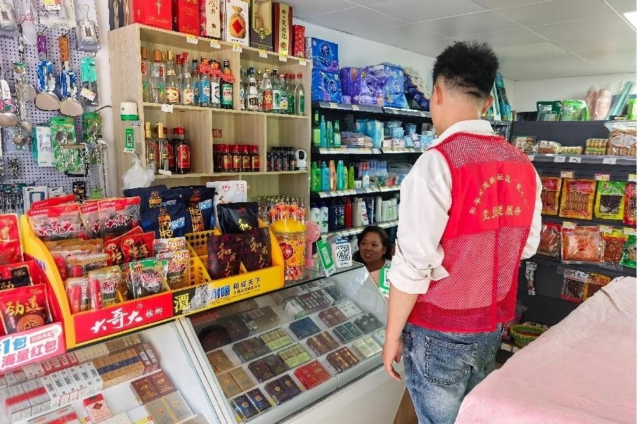 “尚德守法·共享食安”零距离：桃李社区开展食品安全周宣传活动