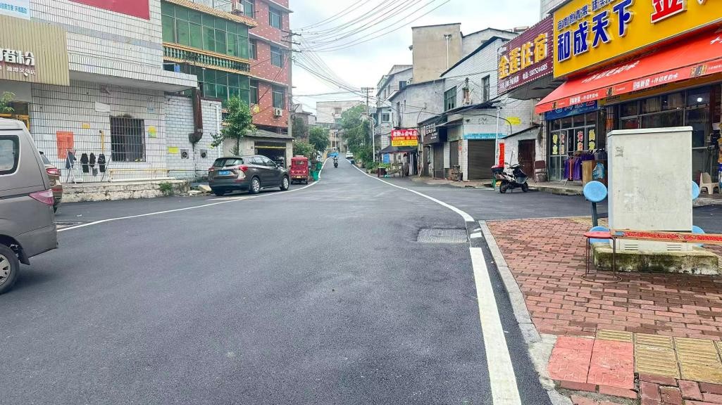 羊牯村：多方聚力铺坦途，村企同心惠乡邻